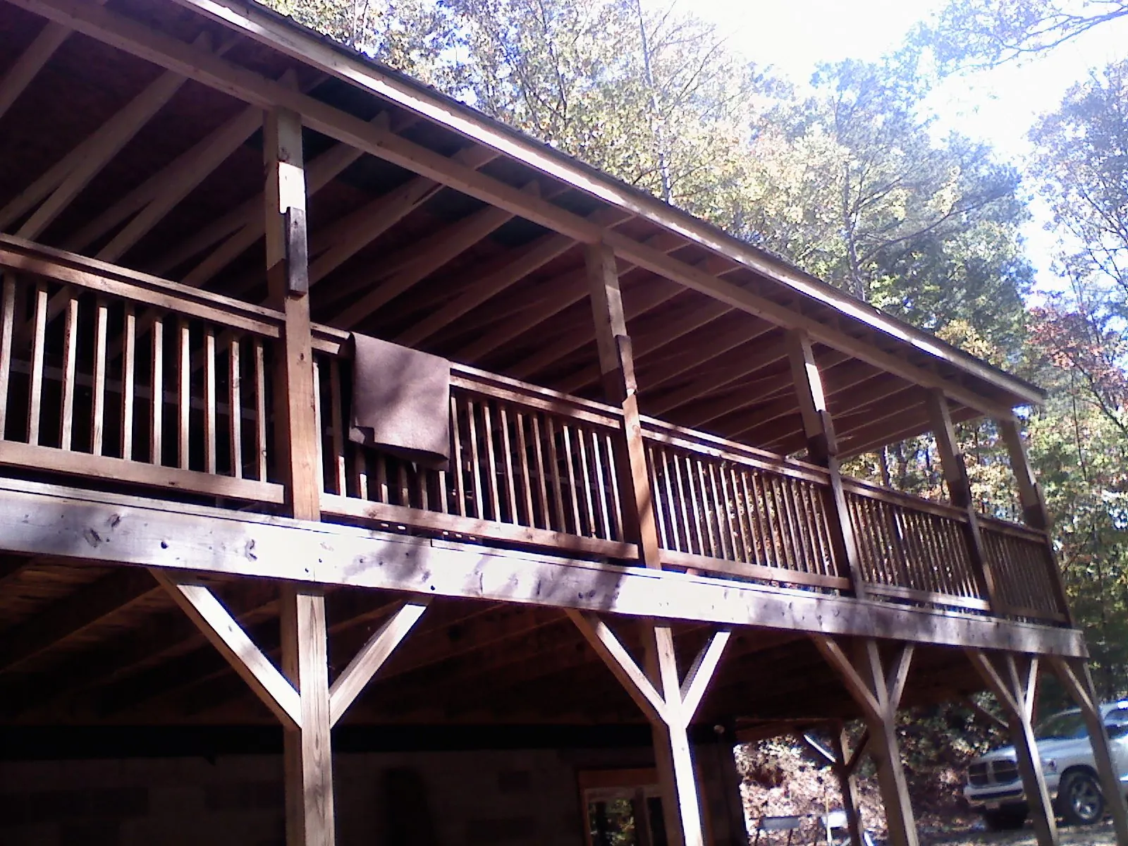 Timber framing under a new elevated porch and deck — Roof Leak Repair in Monson by Roofing Brothers